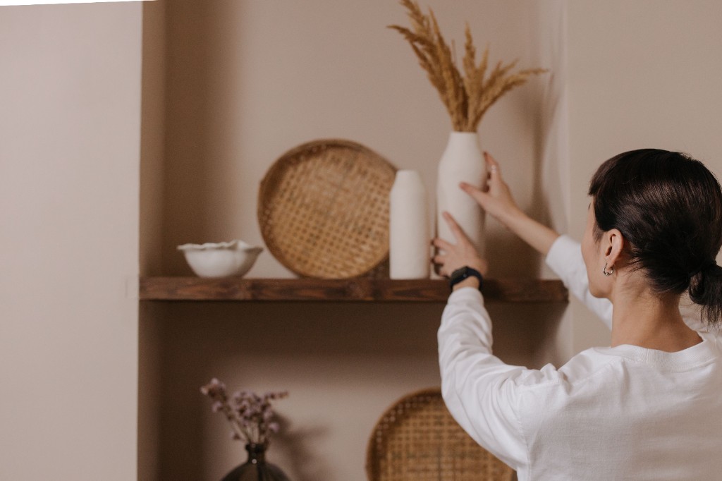 Styling a shelf with ceramics and dried botanicals